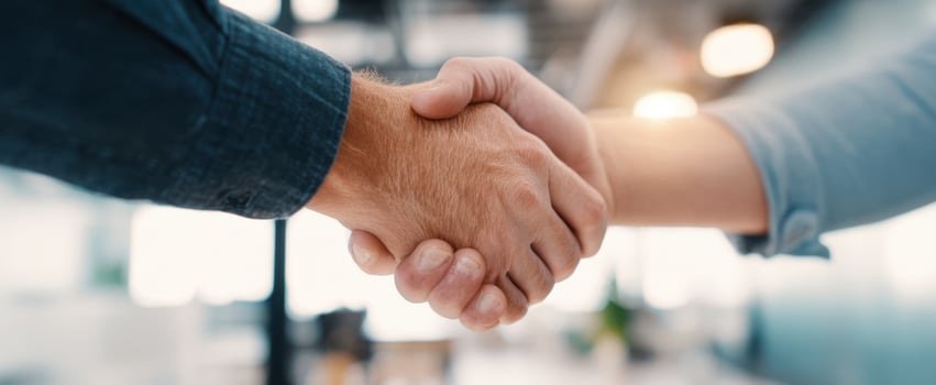 The Handshake Between Two Business Partners Sealing a Professional Agreement in Modern Office photo
