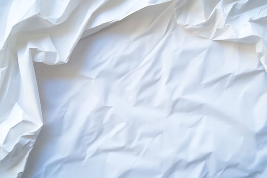 Crumpled white paper texture background photo