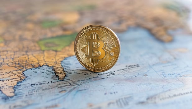 Global Cryptocurrency Bitcoin on World Map photo