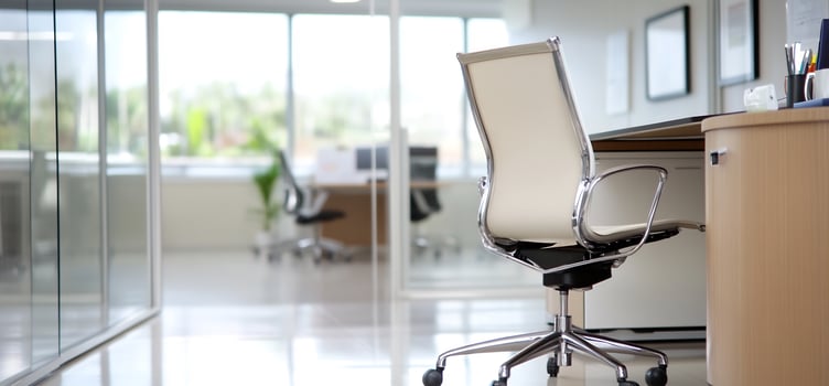 Empty office chair near desk, modern office background photo