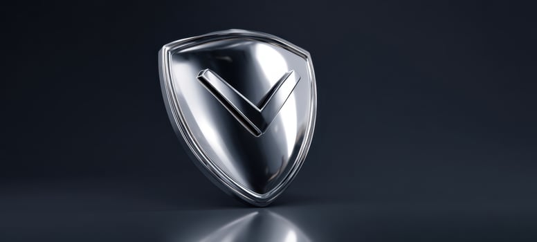 The Shield Emblem Reflective Chrome Badge Symbolizing Security, Protection, and Verification photo