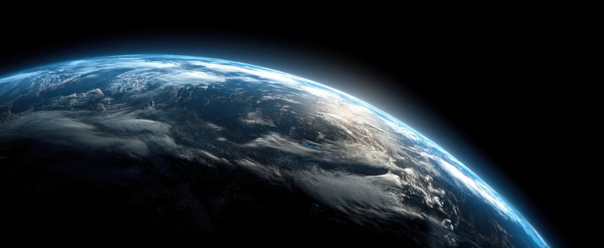 The Earth Seen from Orbit Showing Curved Blue Atmosphere and Cloud Covered Continents photo