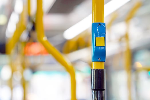 Yellow stop button for bus. photo