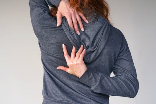 Young woman pain at lower back photo