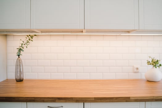 Modern kitchen countertop featuring elegant decor and a minimalist design. photo