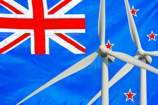 Two Wind Turbines for alternative energy on New Zealand flag background. Wind turbines generating electricity photo