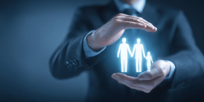 The Hands Protecting a Holographic Family Representation in a Business Context photo