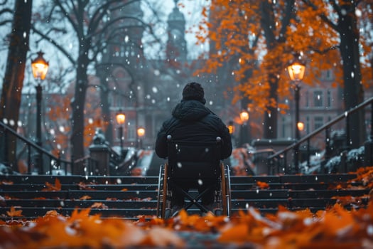 Accessibility and inclusion person in wheelchair with autumn leaves on staircase photo