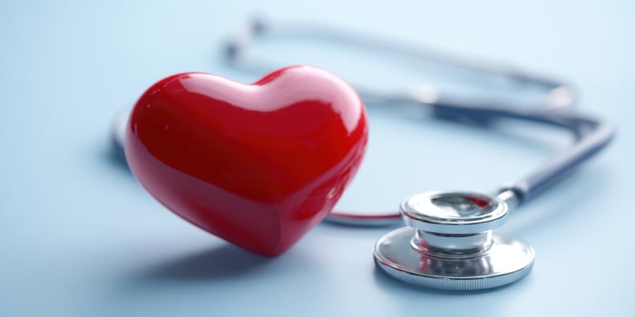 The heart and stethoscope symbolizing care and health in medical practice. photo