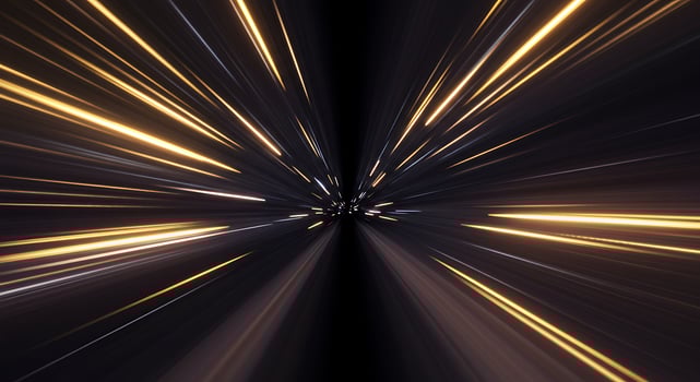 Abstract light trails in a black background photo