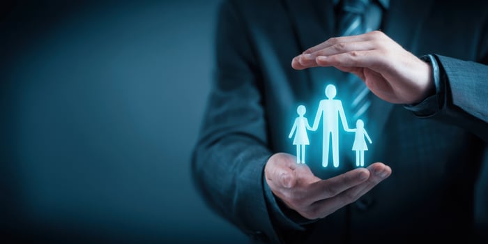 The Hands Representing Family Protection in a Digital Future photo