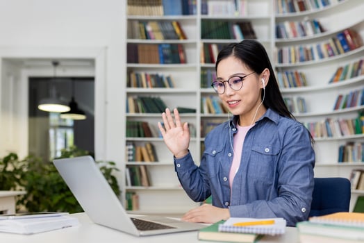 Woman engaged in online learning photo