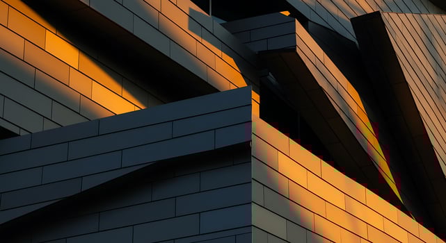 Angular Facade Ablaze with Golden Sunset Light and Deep Shadows photo