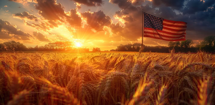 Golden wheat field american flag at sunset rural landscape photo