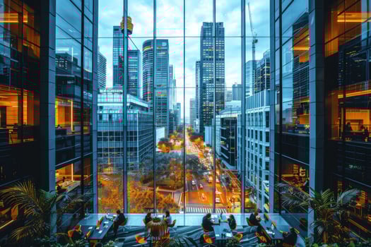 Urban skyline through glass window office building architecture photo