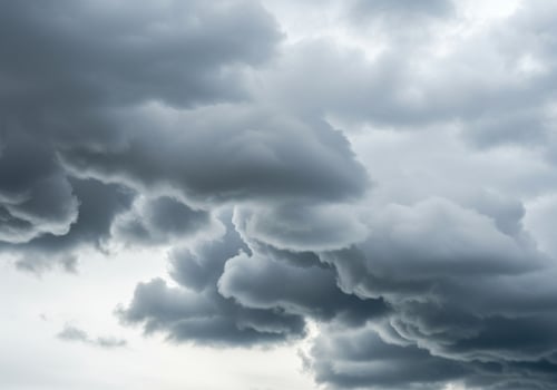 Dramatic dark storm clouds gathering in the sky, indicating impending bad weather photo