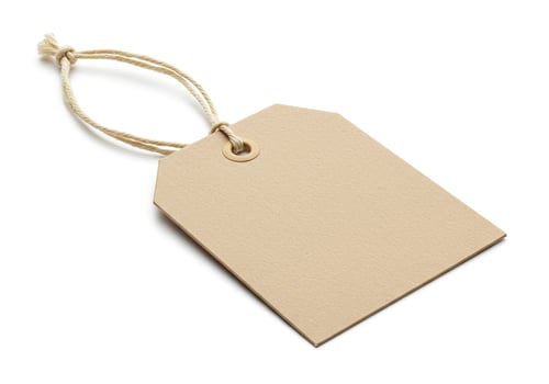 Blank kraft paper tag with string isolated on white background photo