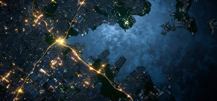 Night city aerial, roads, lake, urban sprawl photo