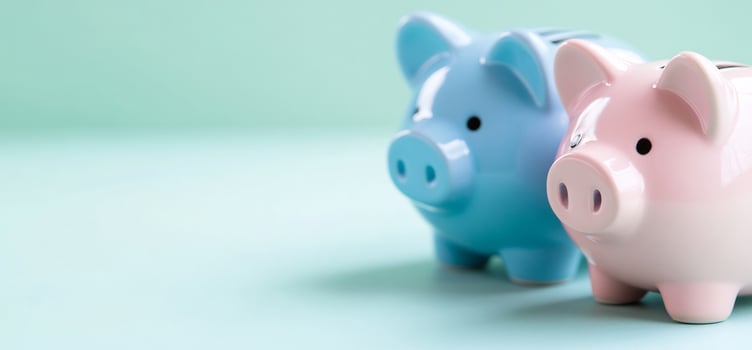 Piggy banks saving money, blue background. Finance photo