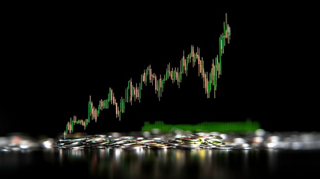 Rising Stock Market Graph Over Coins photo