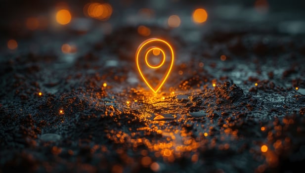 Digital location pin glowing on rough surface tech concept photo