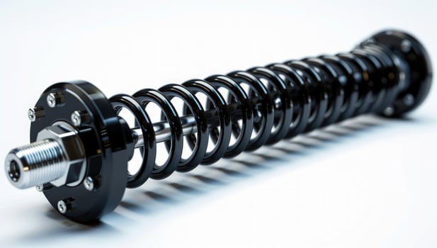 Black metallic mechanical spring component for engineering and automotive applications photo