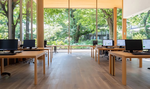 Modern computer lab, sunny garden view, wood floors, learning photo
