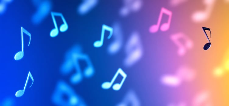Colorful music notes float on gradient vibrant background photo