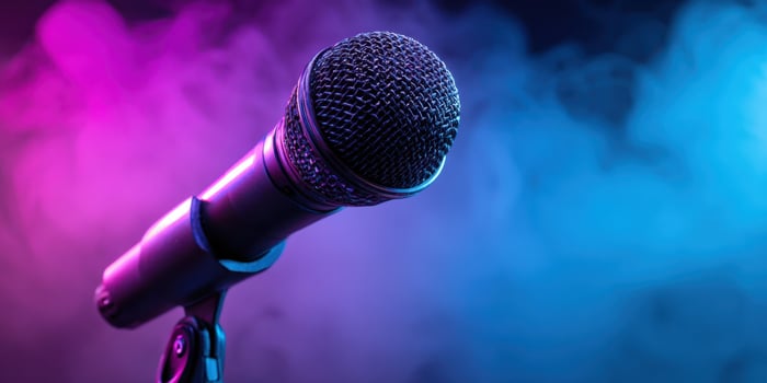 The vibrant microphone with colorful smoke at a live performance scene. photo