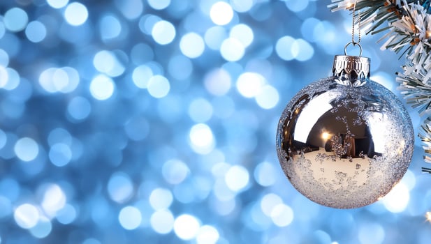 Silver Christmas Ornament on Tree, Blue Lights photo
