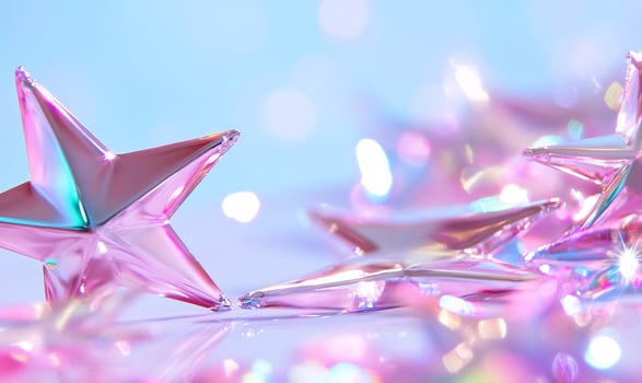 Pink iridescent stars scattered on light blue background. Festive, celebratory backdrop photo