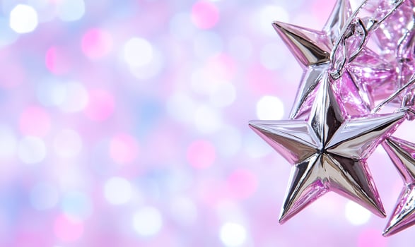 Silver stars, pink bokeh, festive, holiday decor photo