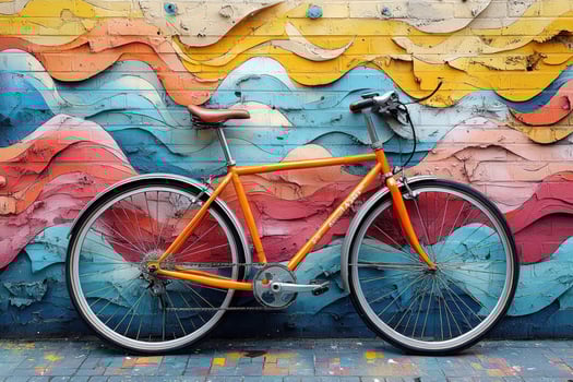 Bicycle parked against multicolored abstract wall art urban transportation photo