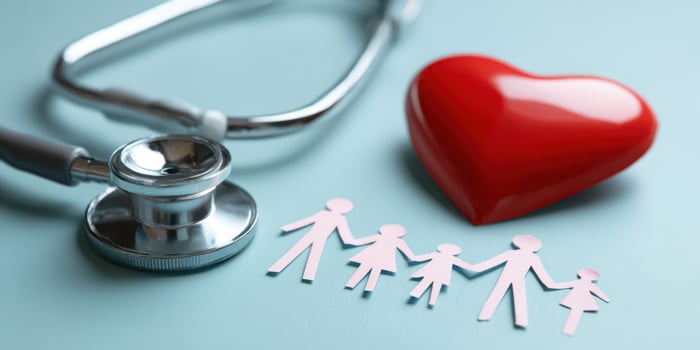 The heart symbolically represents family health and care in a supportive environment. photo