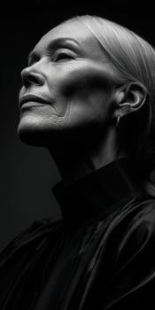 A black and white photo of an older woman