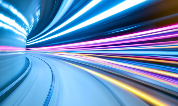 City tunnel, fast car lights, motion blur, background glow, technology concept photo