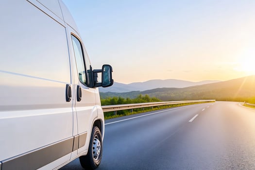 White van highway sunset delivery mountain road photo