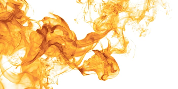 The dynamic flow of orange smoke creating an abstract visual masterpiece. photo