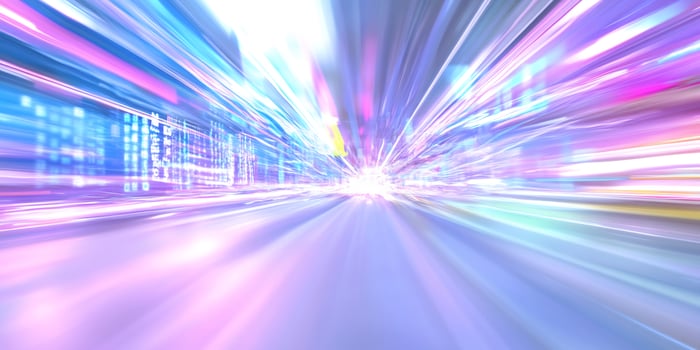 City night drive, speed blur, vibrant lights, urban background, motion photo