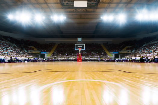 Empty basketball arena, bright lights, crowd, game photo