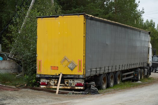 An Abandoned Yellow Trailer Nestled Deep in the Peaceful Embrace of Natures Beauty photo