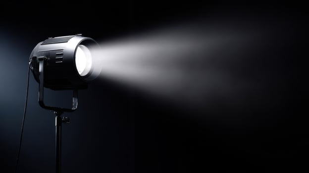 The Spotlight Illuminating a Dark Stage for Dramatic Visual Effects. photo