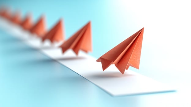 Paper planes leading the way in formation photo