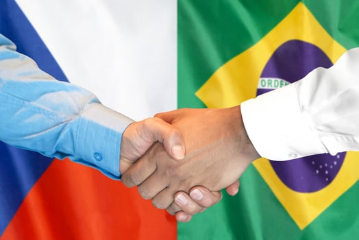handshake on Brazil and Czech Republic flag background. photo