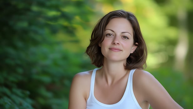 Woman smiling, nature background, outdoor portrait, website use photo