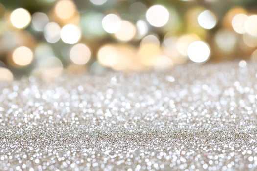 Sparkling glitter background, bokeh lights. Holiday card design photo