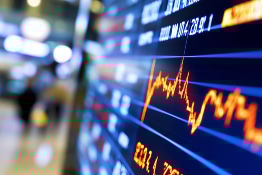 Stock market data display, falling graph, city background, financial news photo