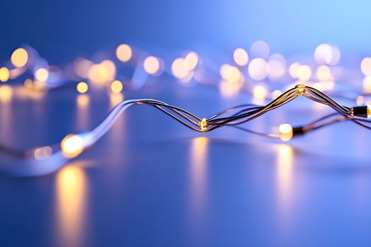 Festive lights curve on blue background photo