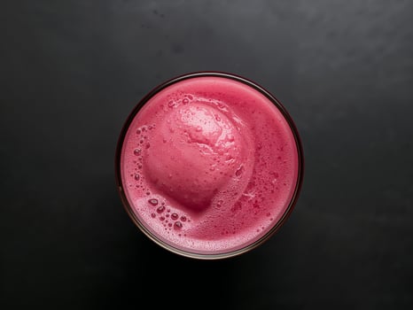 Fresh Beet Juice in Glass, Top View. Healthy Beverage for Wellness and Detox. photo