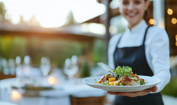 Food presentation by waiter at restaurant or catering service photo